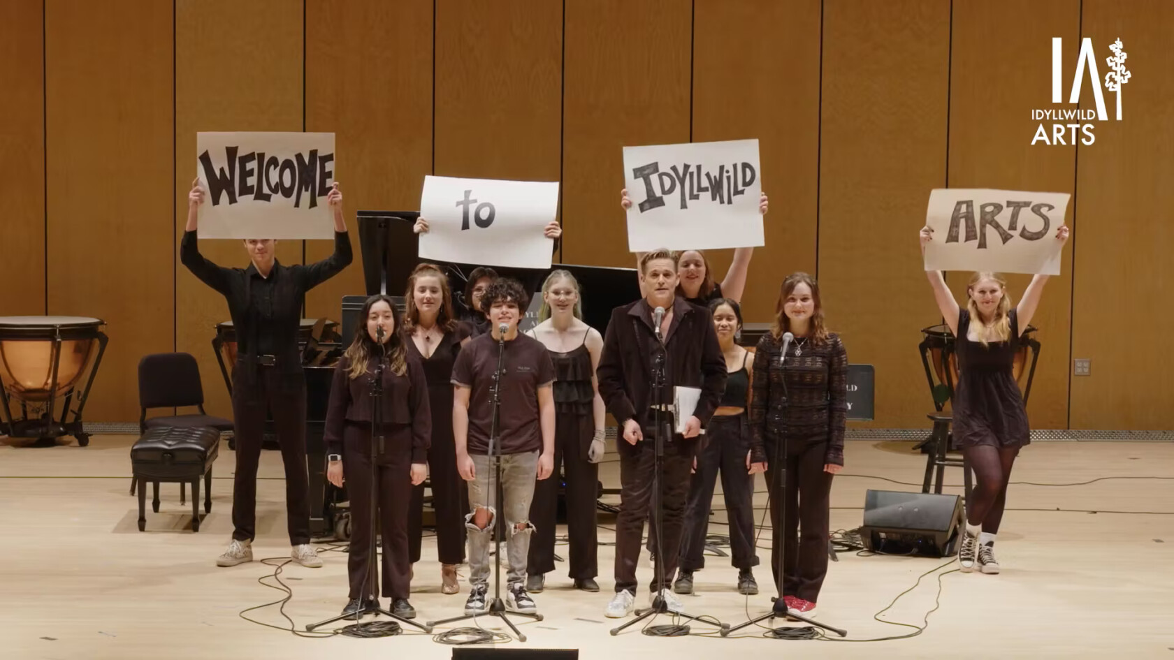 A group of students on stage.